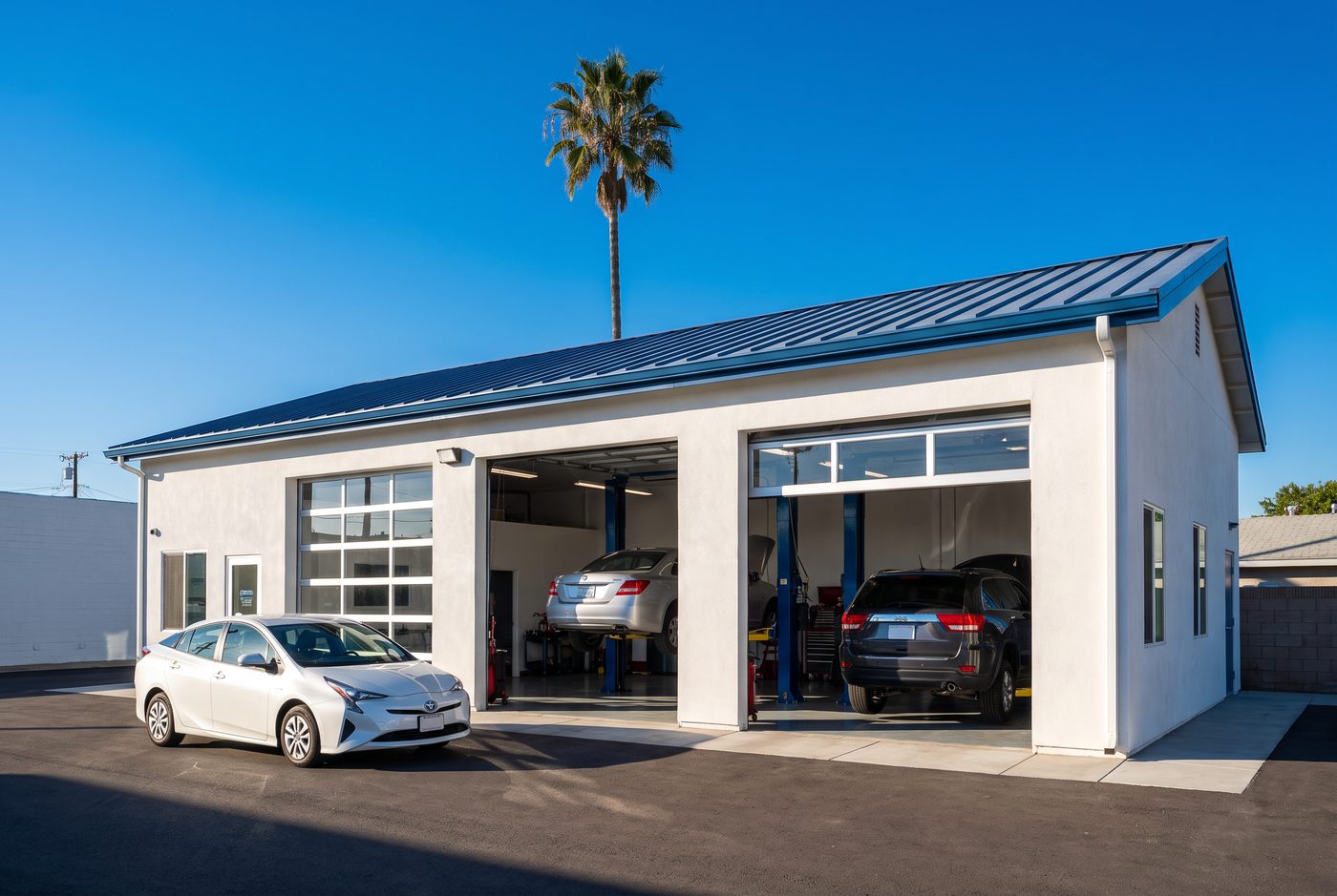 Independent hybrid repair shop with open service bays in San Diego
